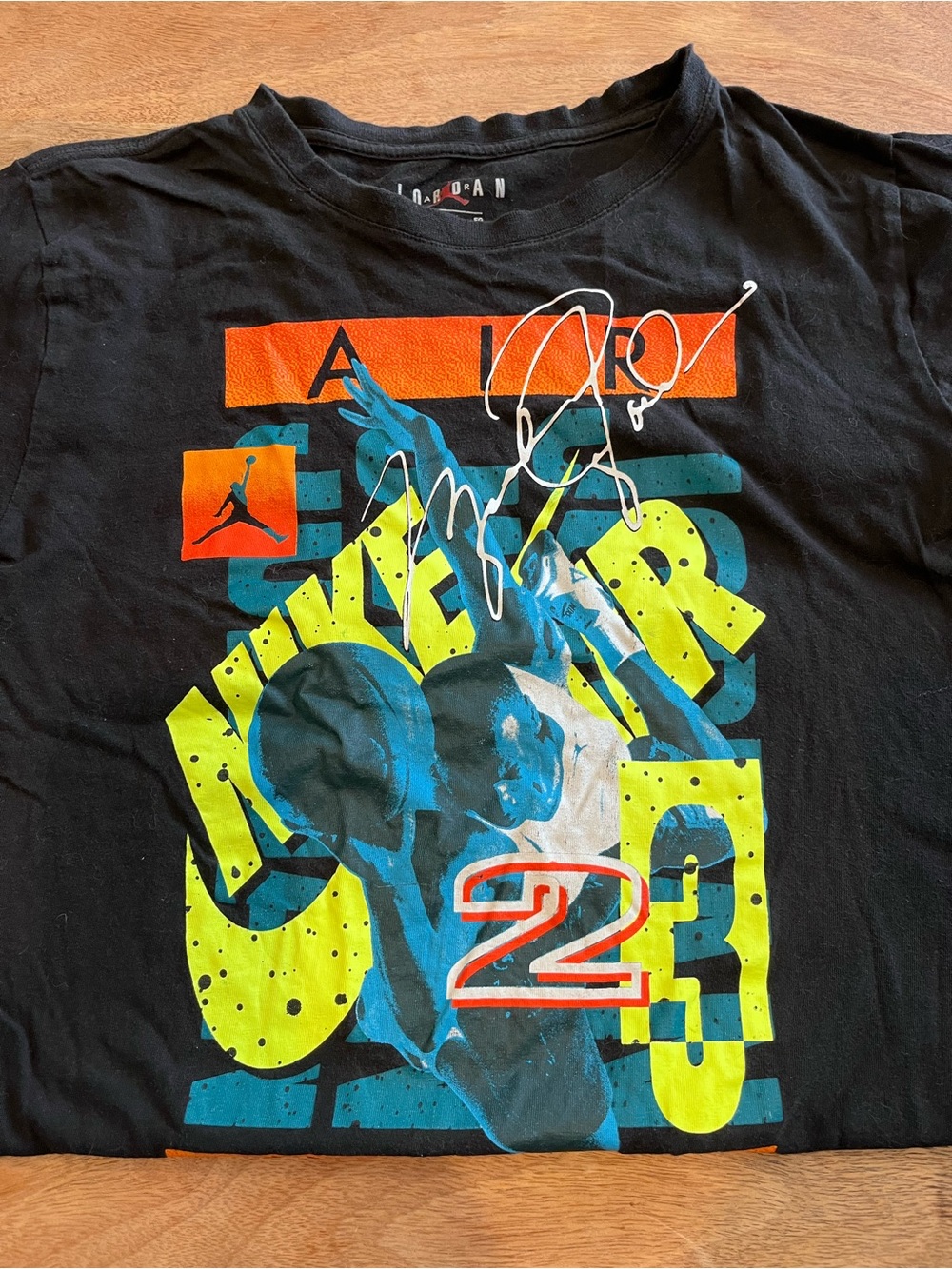 Jordan Black Tee with Neon Yellow, Blue & Orange Graphic